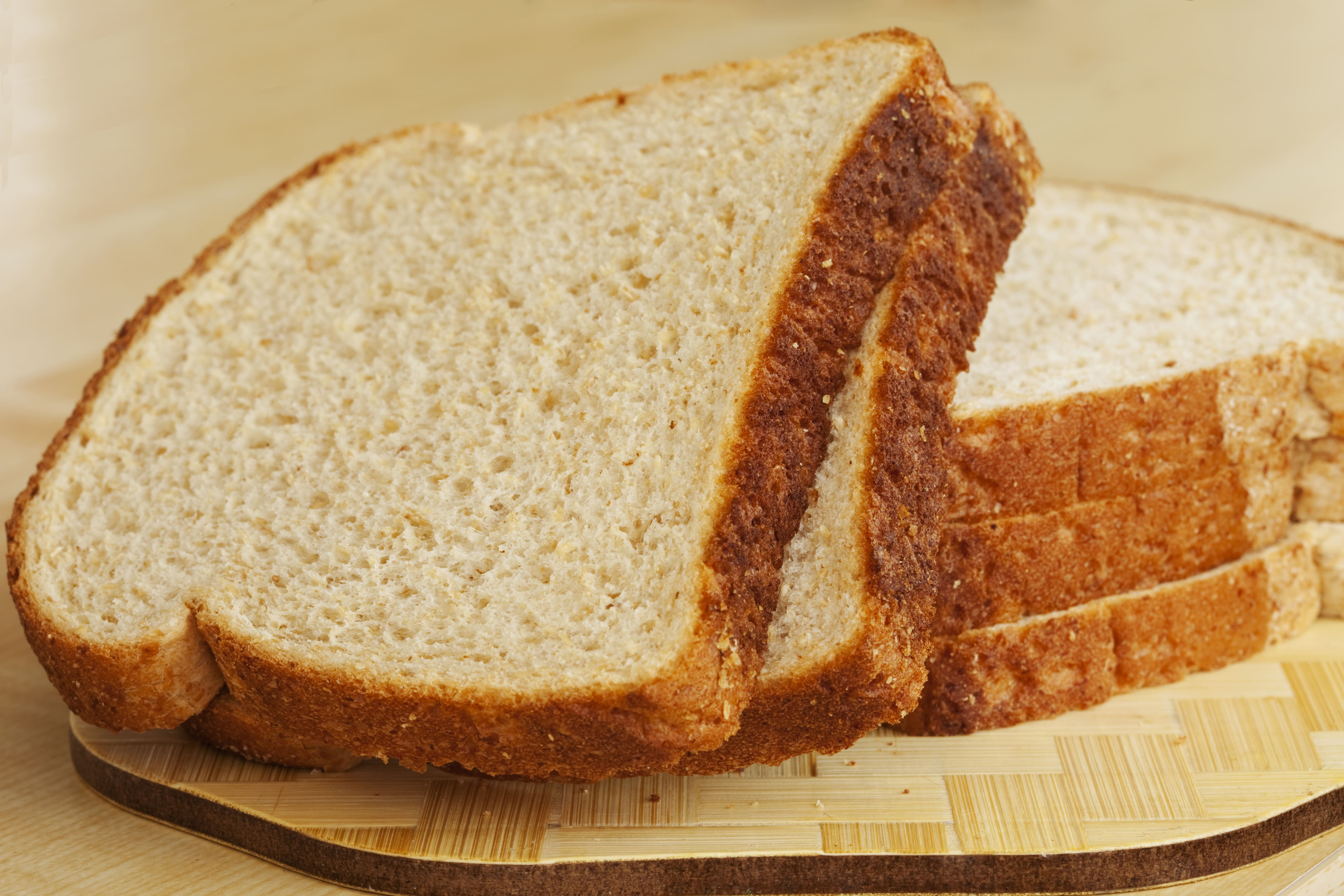 Sliced bread on a wooden board