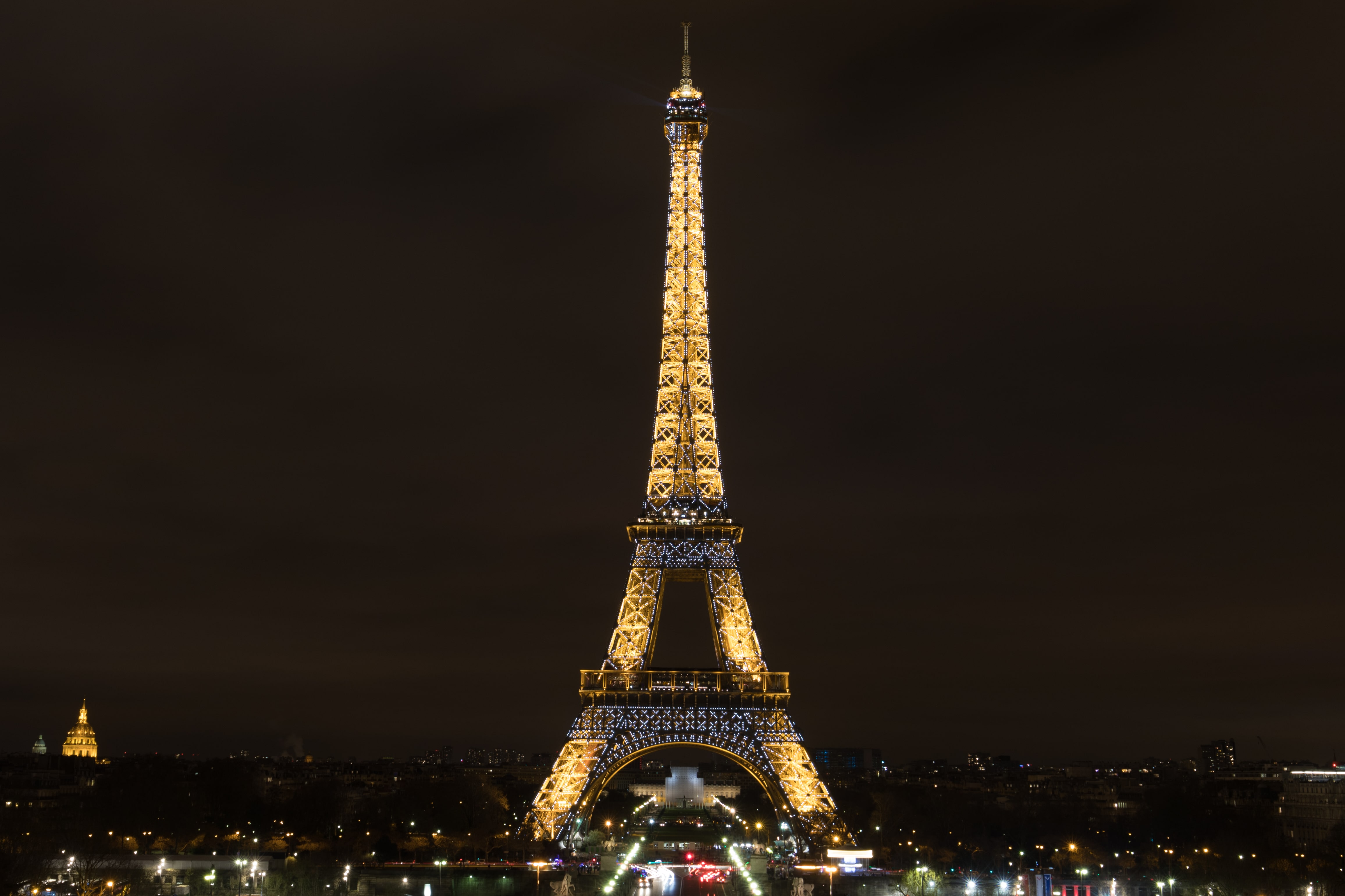 Eiffel Tower illuminated at night in Paris, France