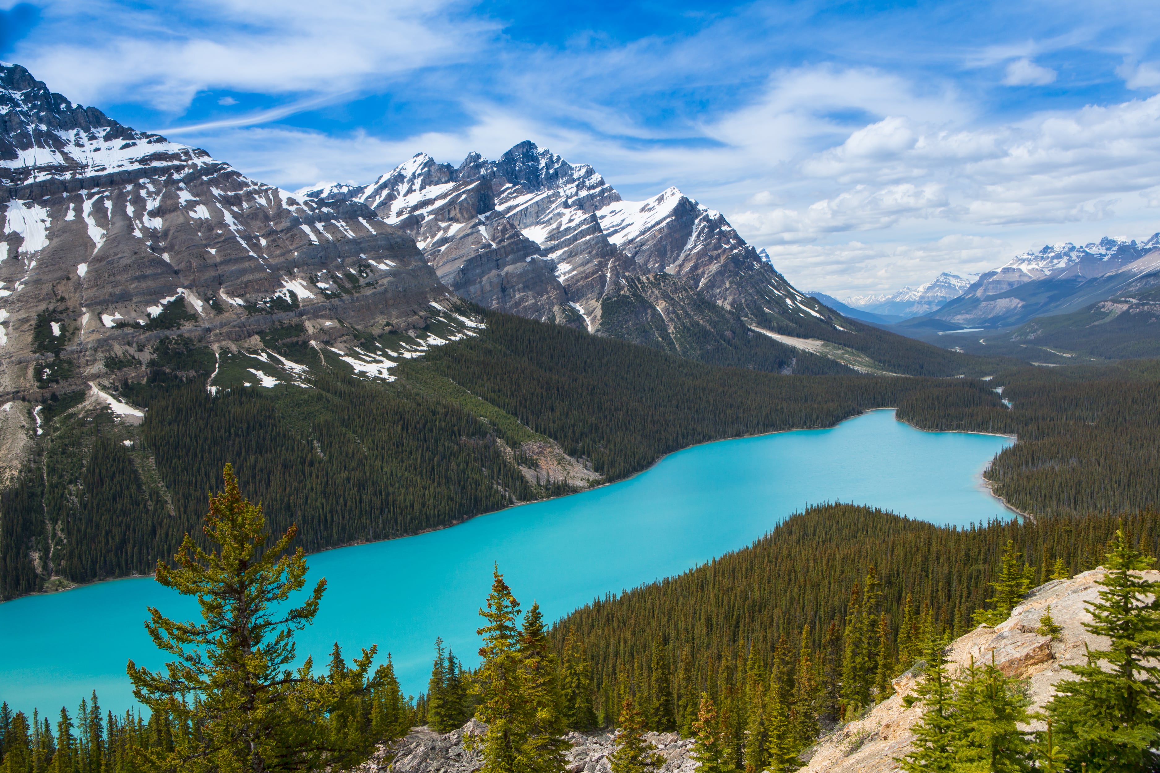 Peyto lake pictured amid snow-capped mountains in Banff National Park, Canada