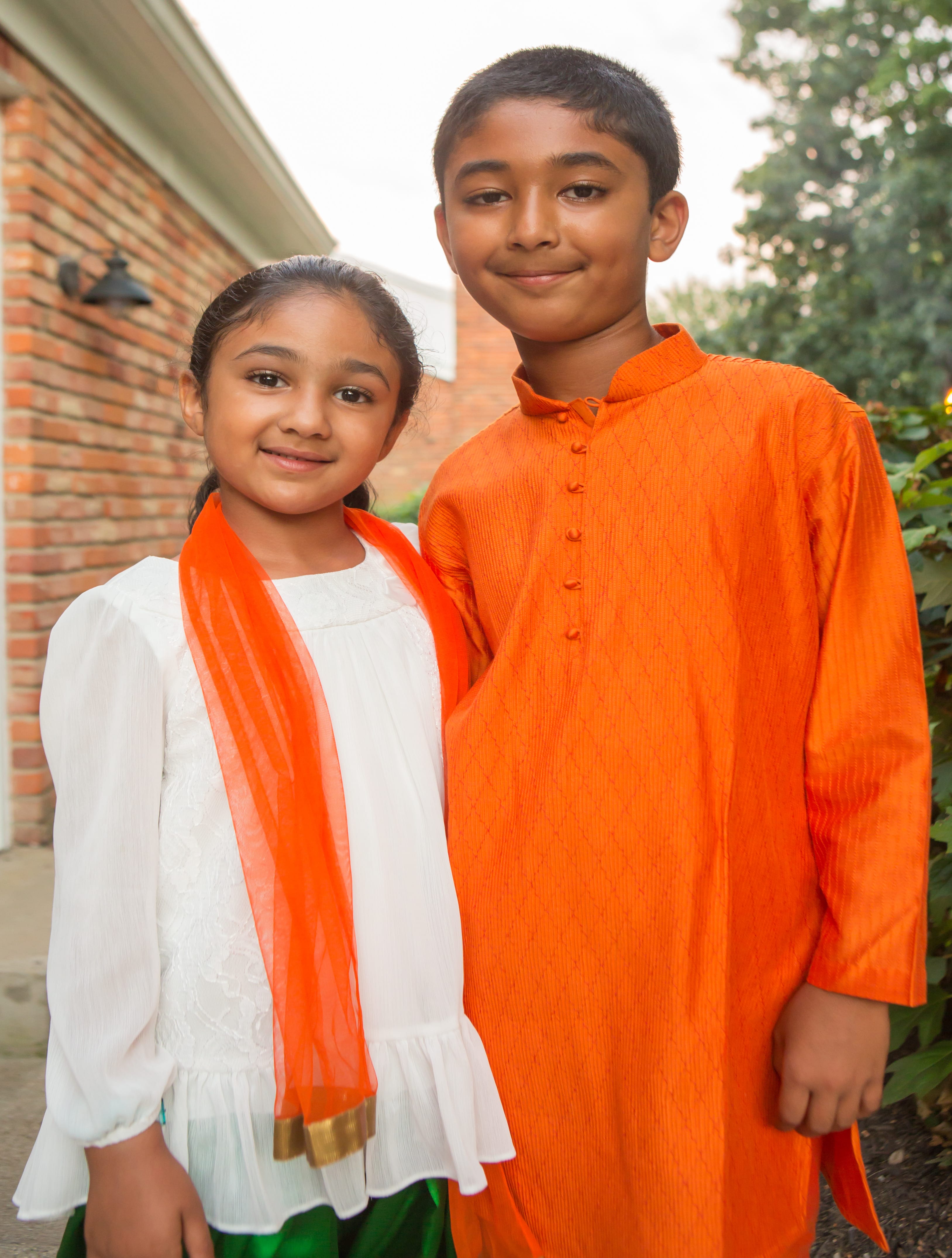 Kids in independence day themed clothes