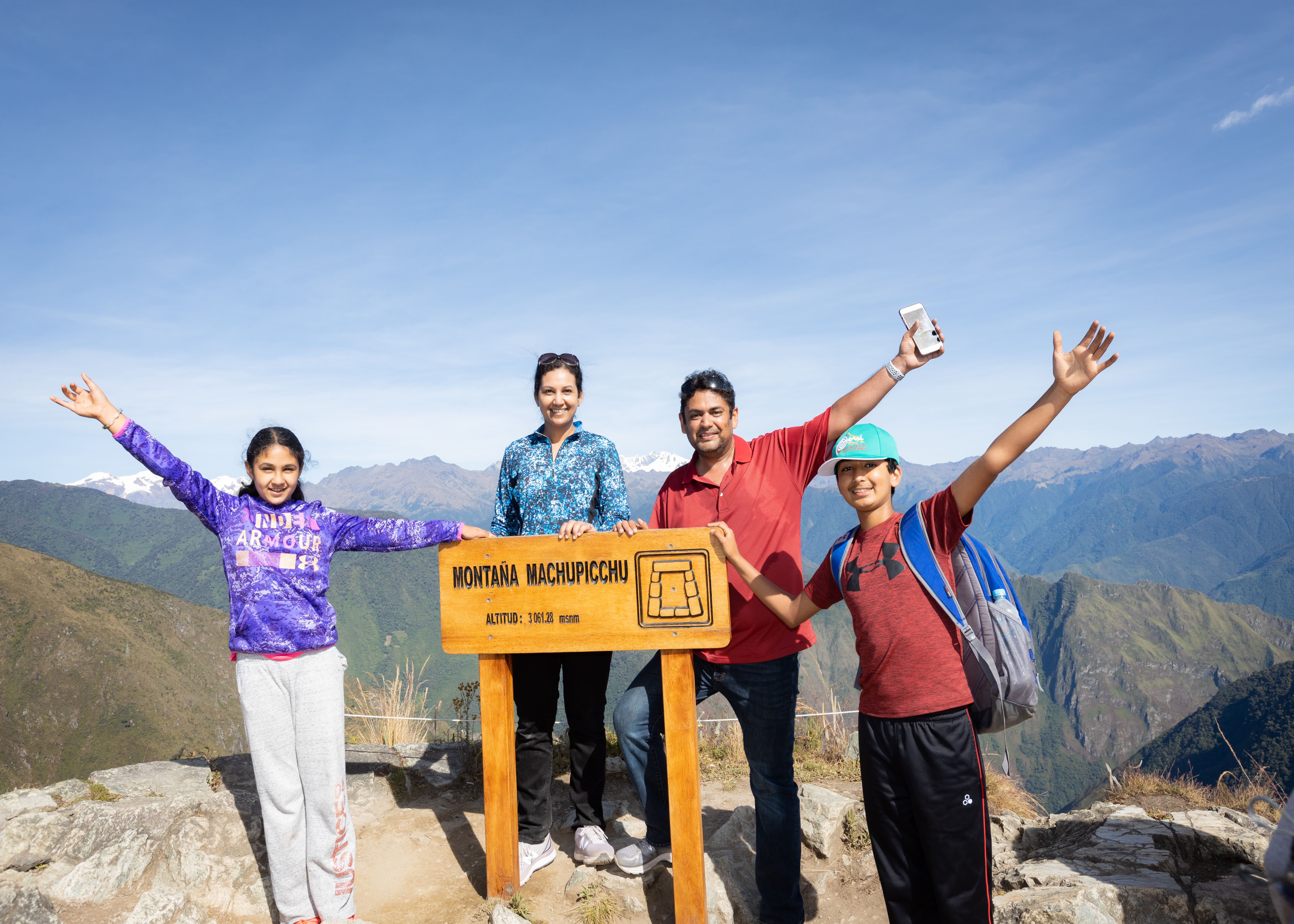 Family at Macchu Pichu Mountain Peak