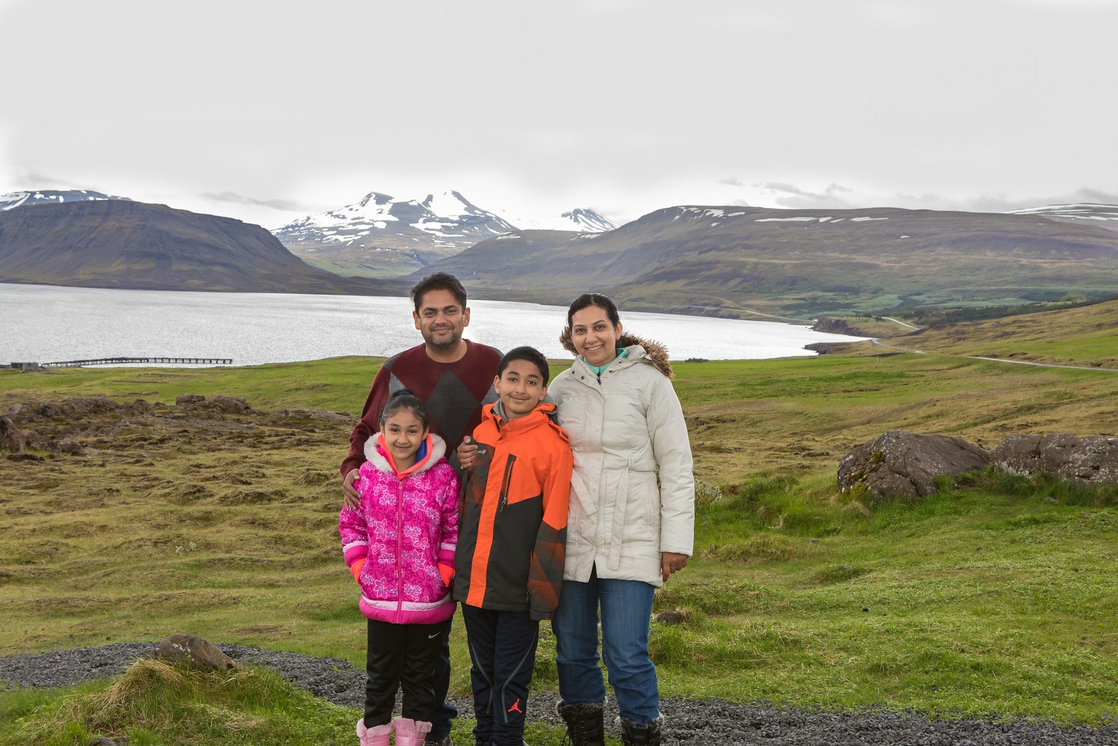 Family in front of glaciers in Iceland
